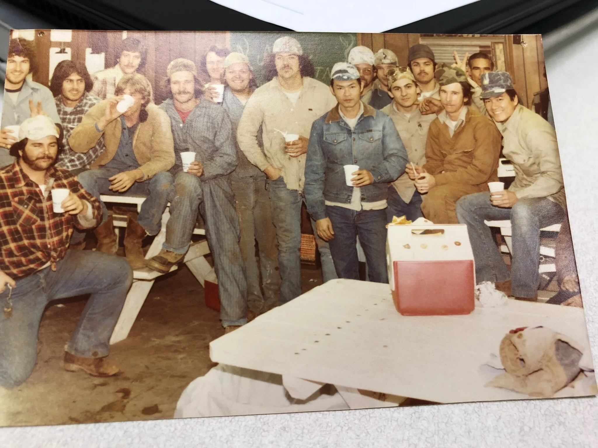 Historic employee group photo from the early years.