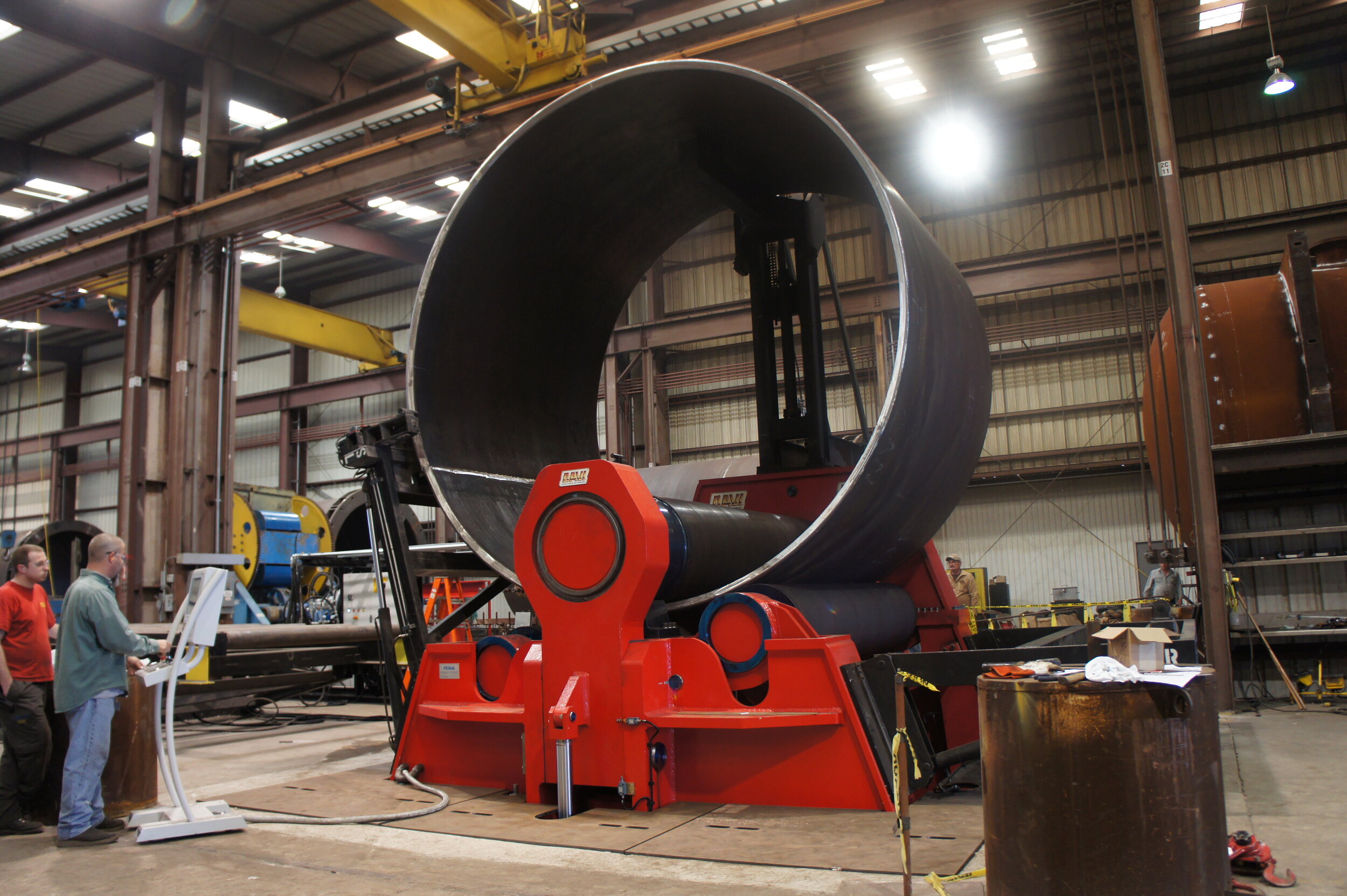 Heavy fabrication machinery and rolling equipment in operation